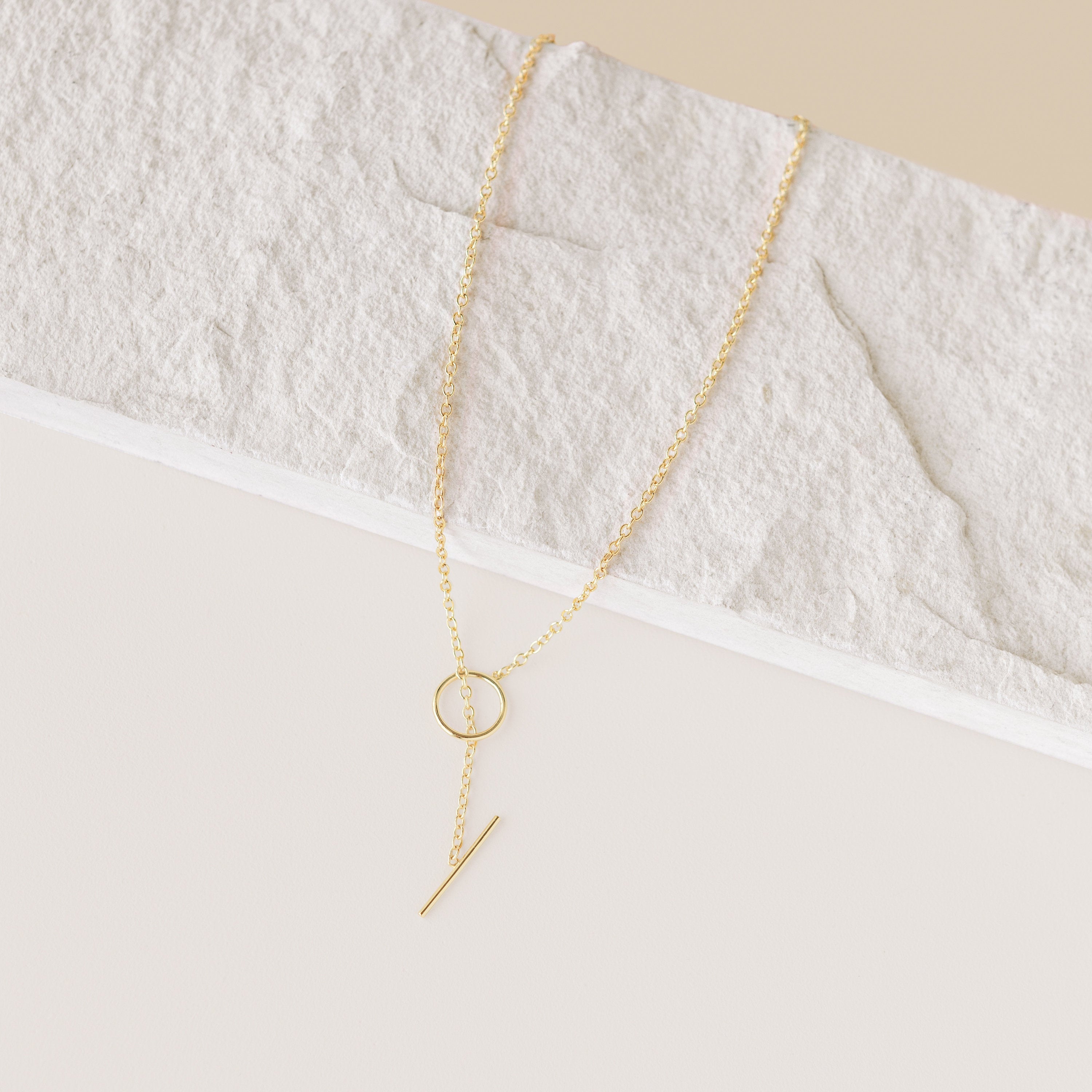 Necklace with toggle clasp.